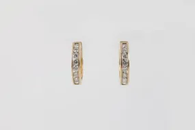 14k Yellow Gold .64tcw Diamond Huggie Earrings (4.41g.)