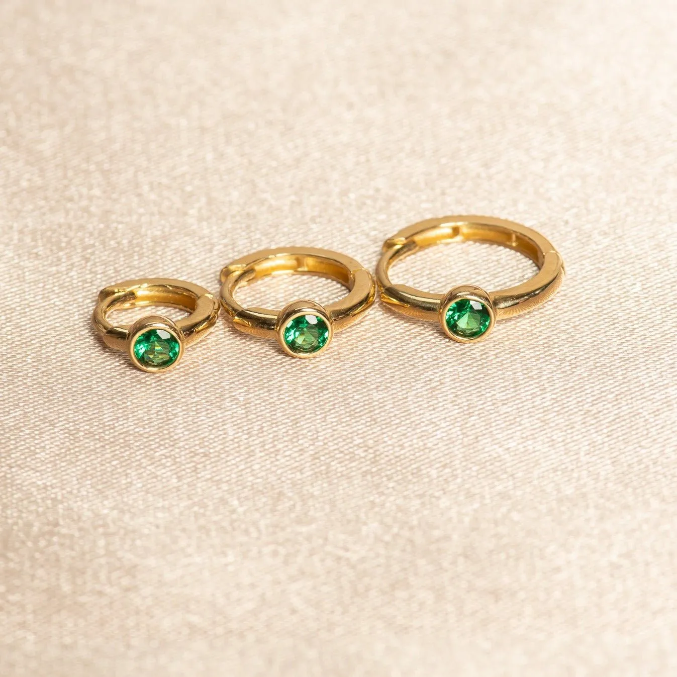 Bezel Set Emerald Huggie in 14k Gold