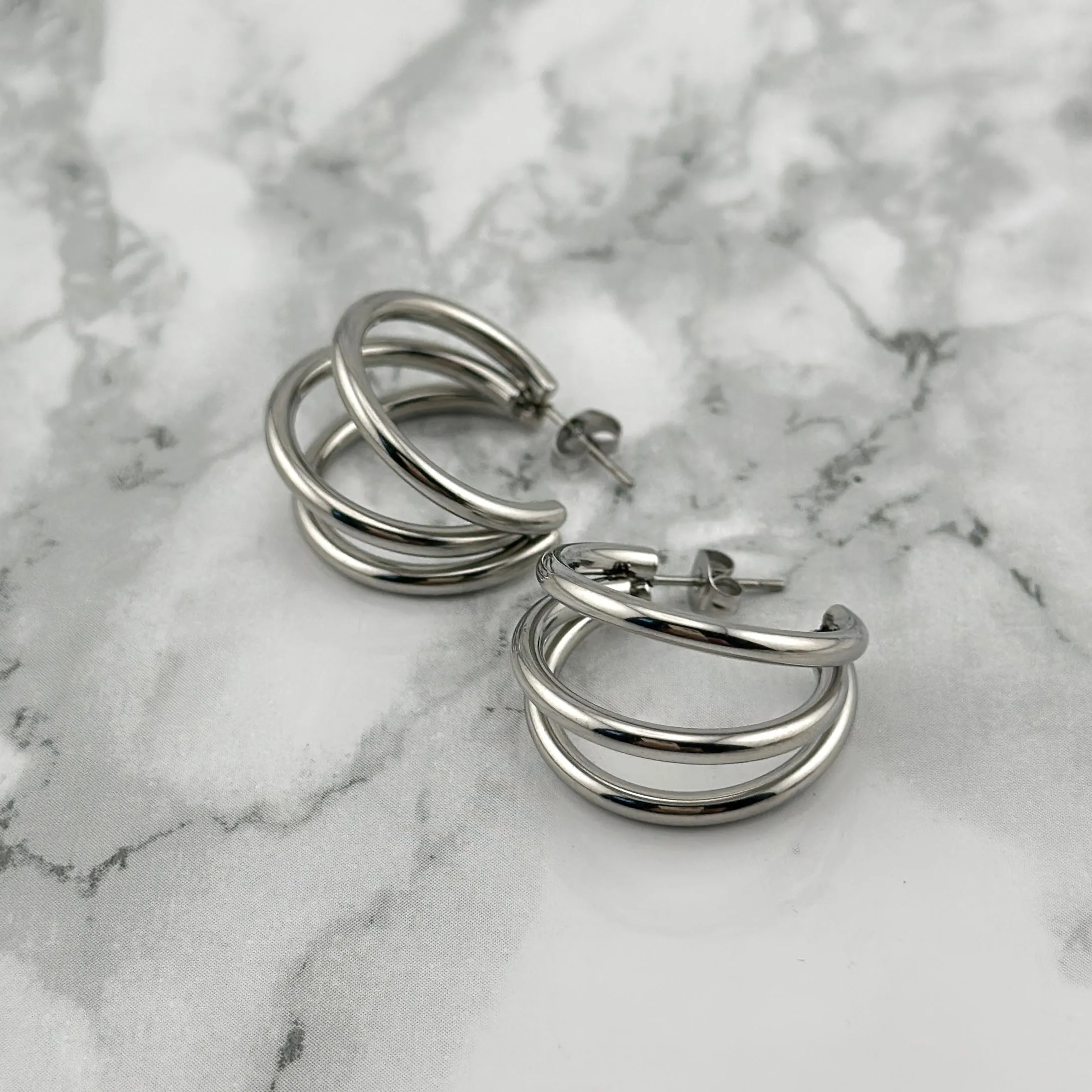 Silver triple hoops