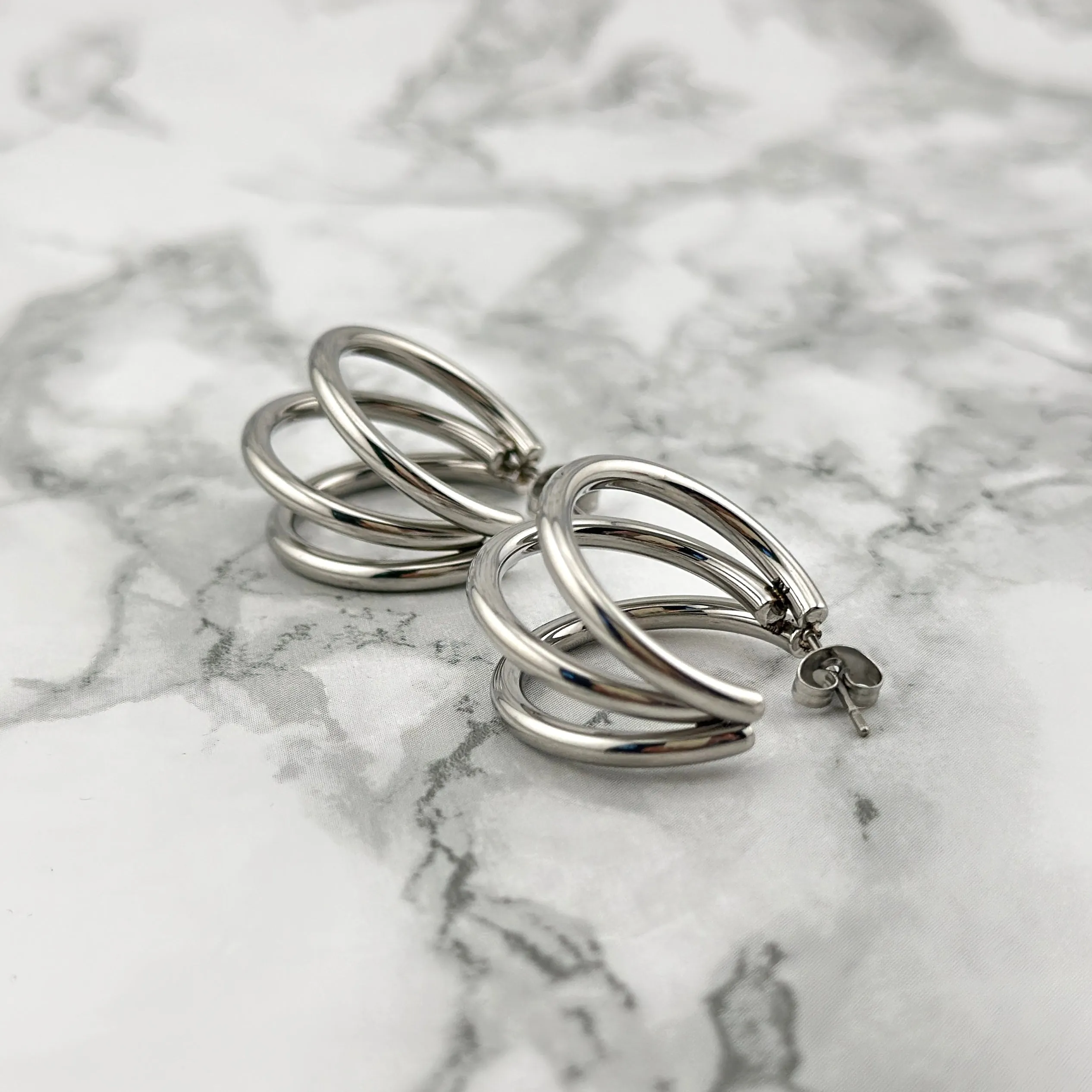 Silver triple hoops