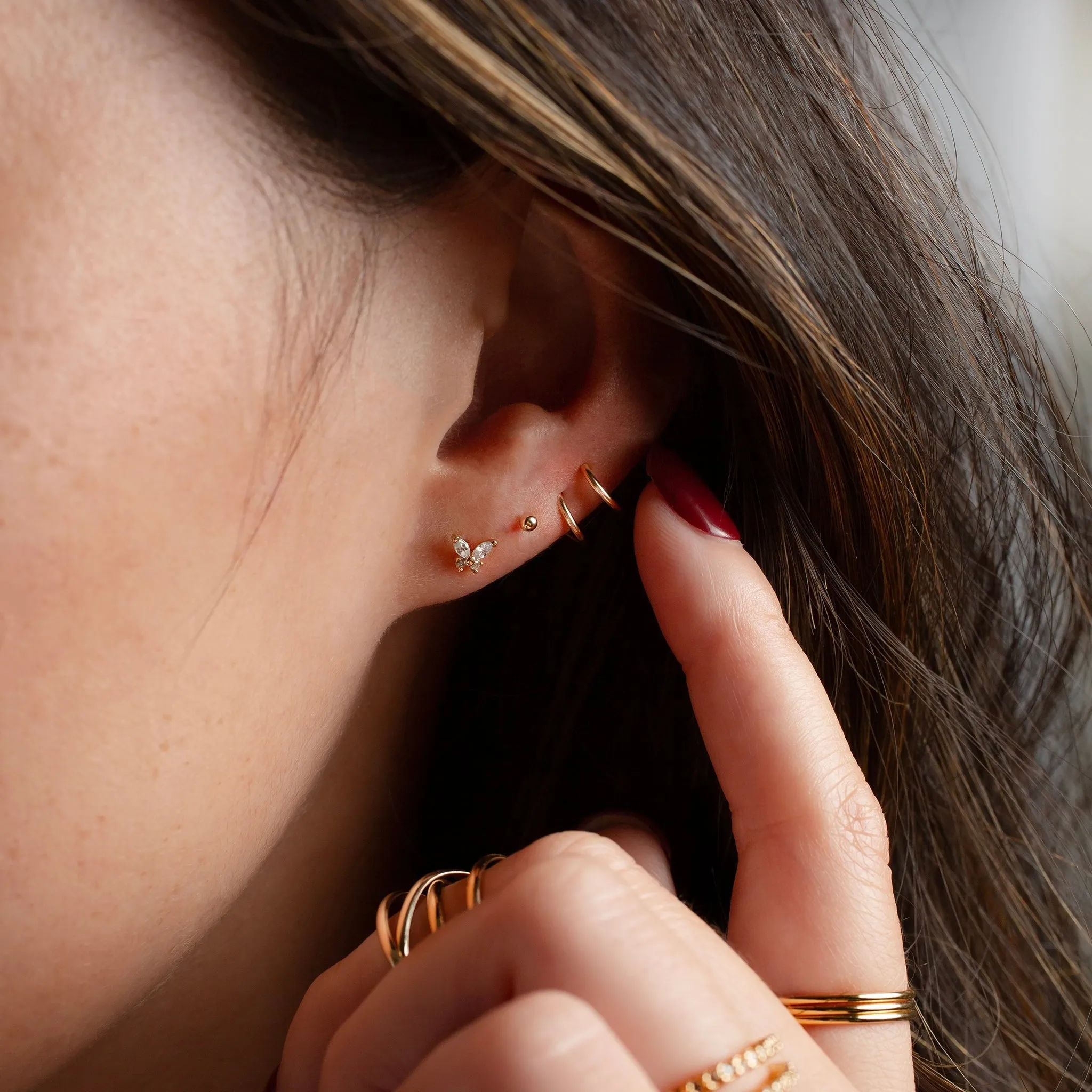 Here’s an optimized title for your e-commerce product:

Elegant Tiny Twist Double Huggie Earrings in 14K Solid Gold - Perfect for Everyday Wear